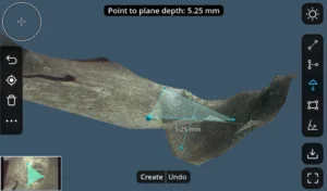 Escaneo tridimensional con videoscopio que muestra la medición de la profundidad de una imperfección en la superficie de un material inspeccionado